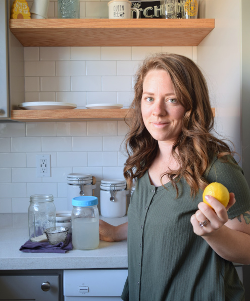 Shelby holding lemon with water kefir